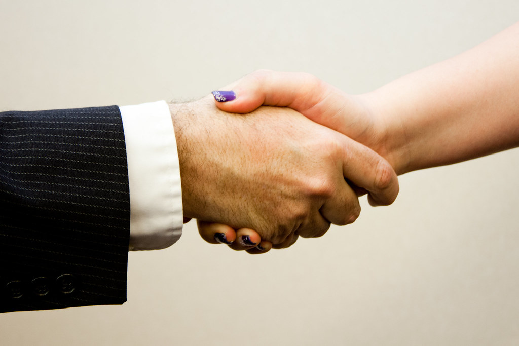 Two people shaking hands