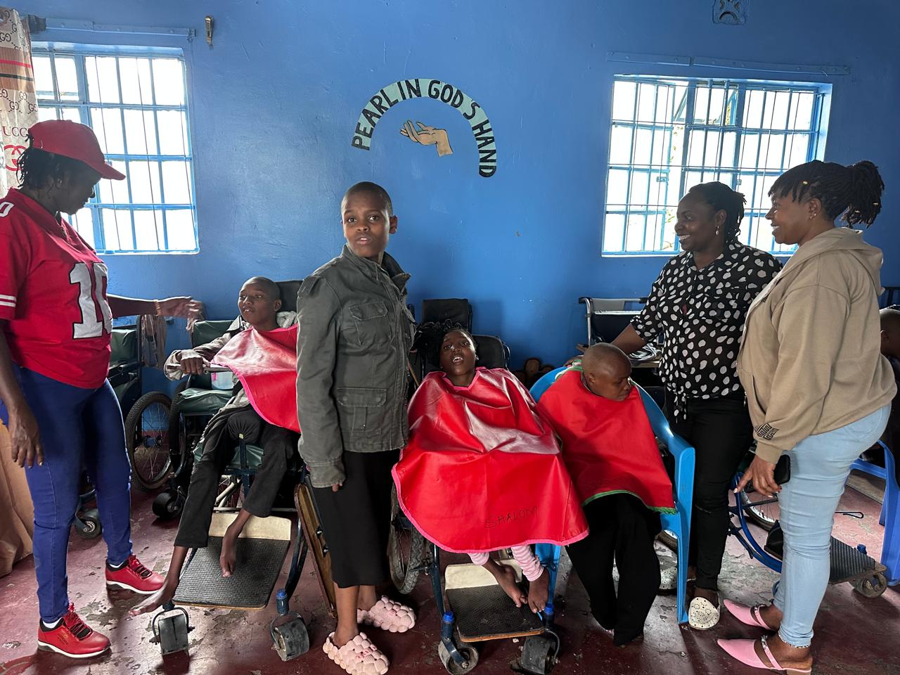Lift A Life Foundation team with children at a care centre in Kenya