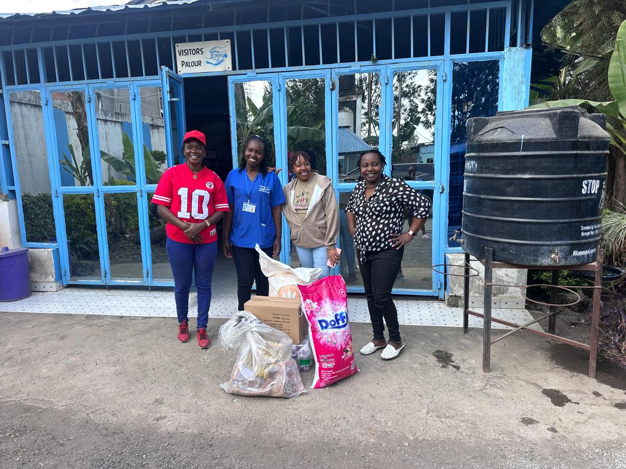 Lift A Life Foundation members outside a care centre in Ruiru during a visit